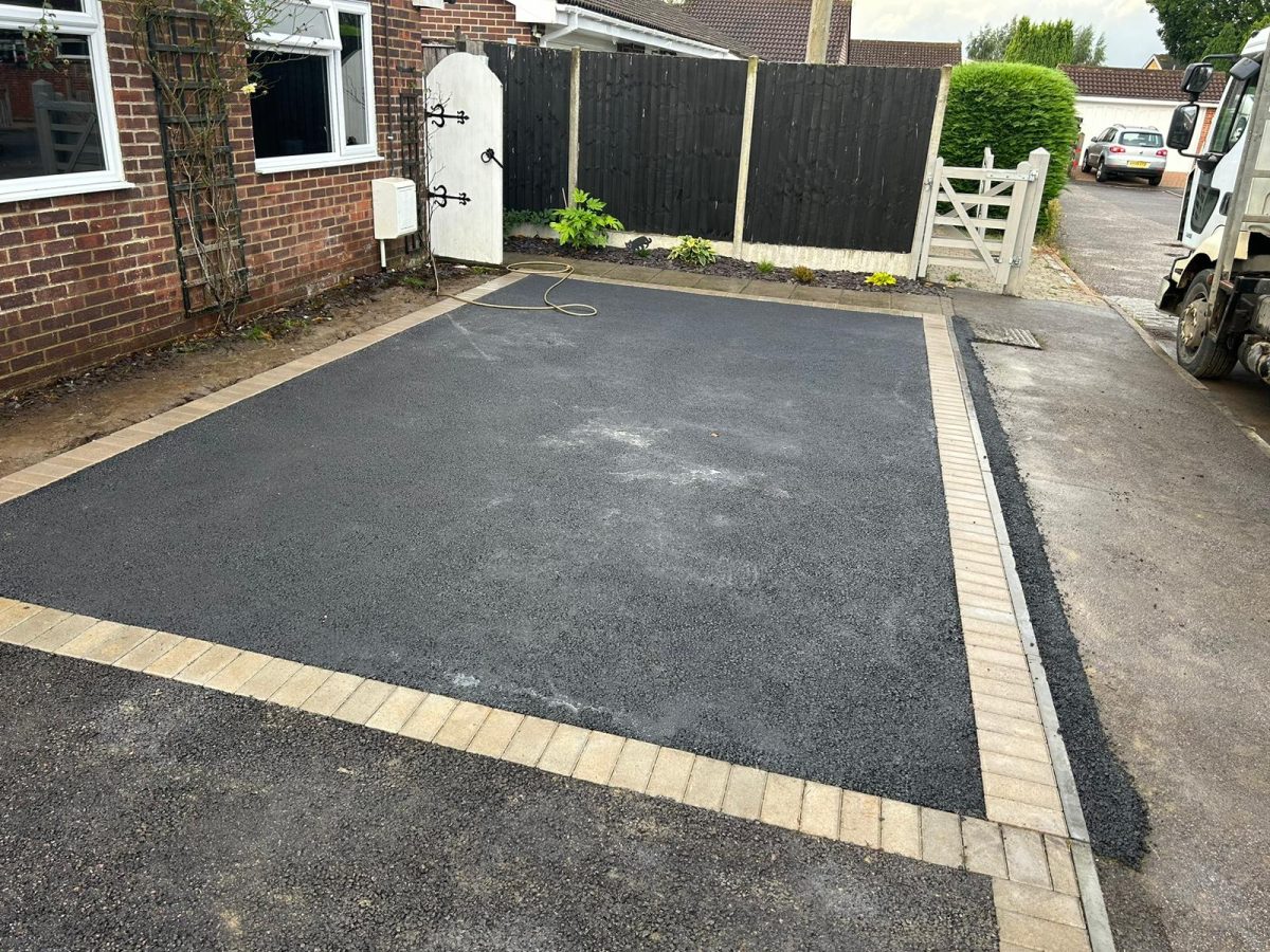Laying tarmacadam surfacing in Guildford, Surrey