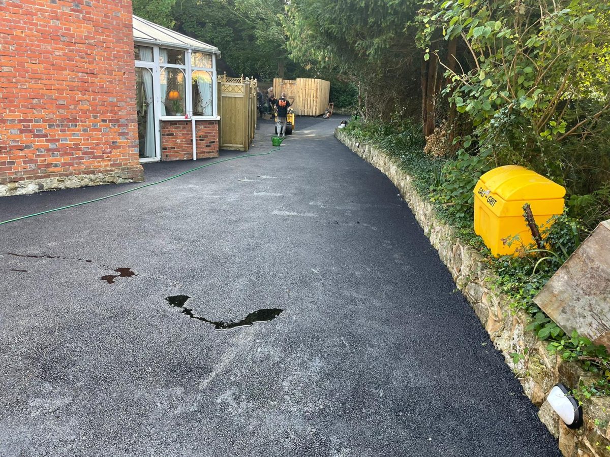 Laying tarmac surfacing in Mayford, Surrey