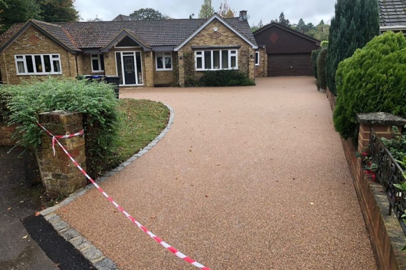 Golden resin stone chip finish on driveway